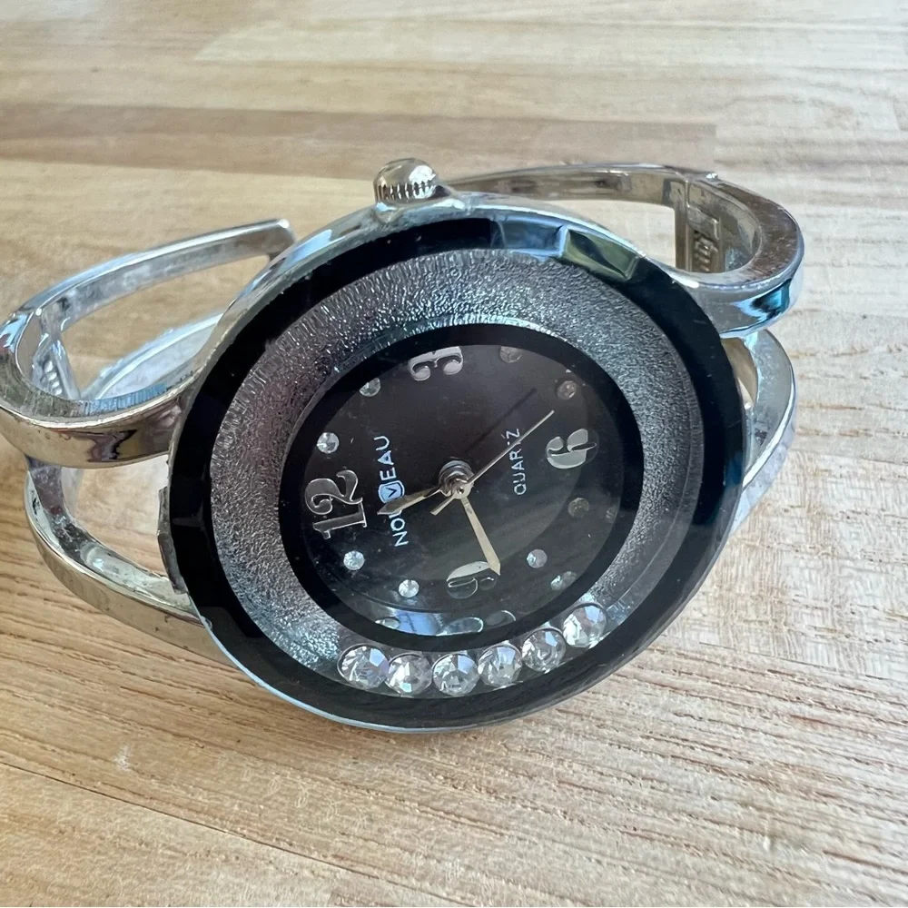 Nouveau ladies silver tone Hinged cuff fashion bracelet watch NEW BATTERY